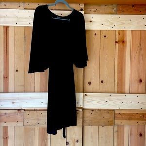 Cute black dress for any casual occasion (just above the knee), dolman sleeves